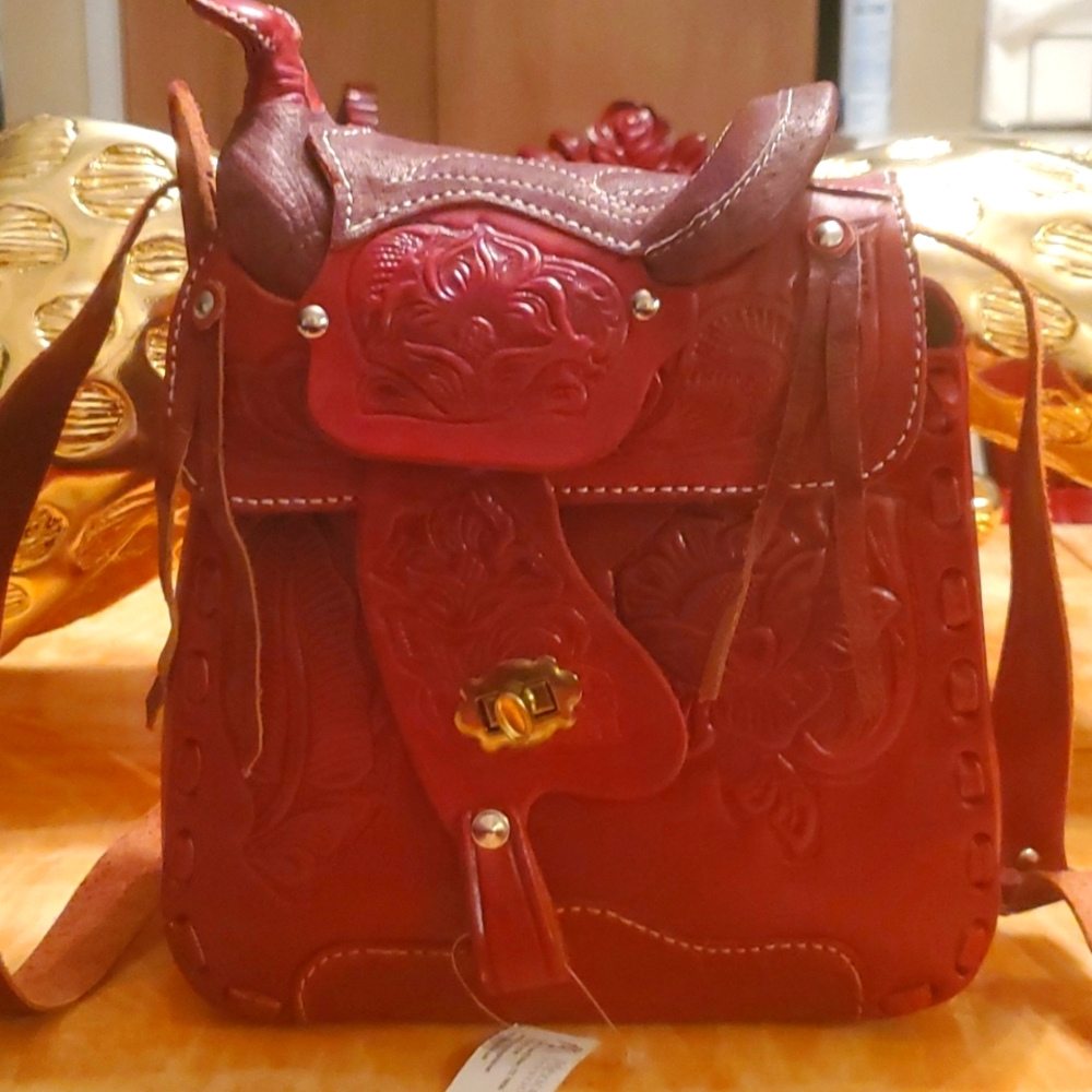 Dark red custom made saddle purse.